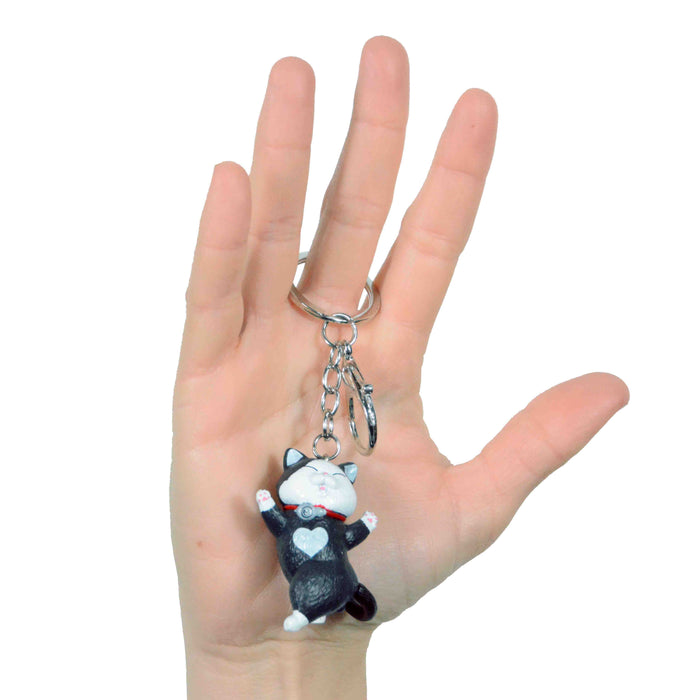 portada gato llavero negro blanco corazon bailando plastico colgante metal