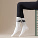 Calcetines yoga gimnasia deportivos modelo elasticado largo sentada