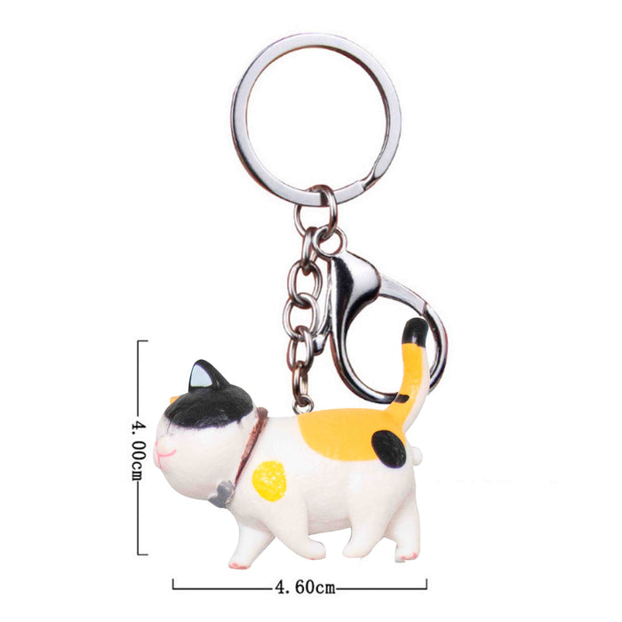 gato llavero negro amarillo blanco plastico colgante metal dimensiones